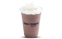 Chocolate Shake in clear logo cup with whipped cream on top