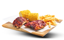 Ribs Chicken Combo Box with corn on the cob and French fries.